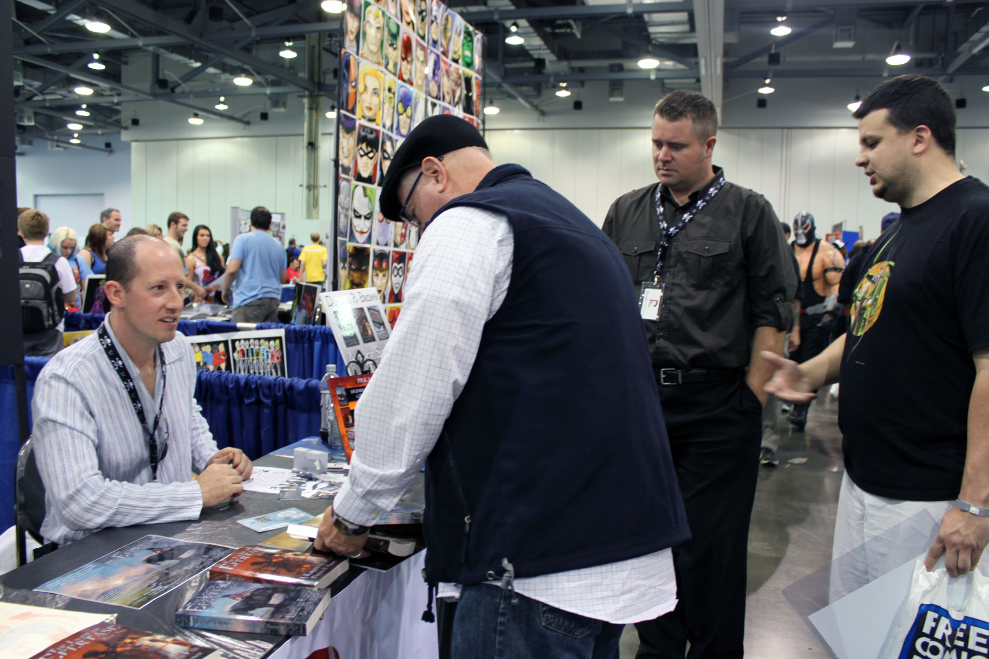 Rhett and two readers signing books with author Douglas Brown at the 2012 Columbus, Ohio Comic Con